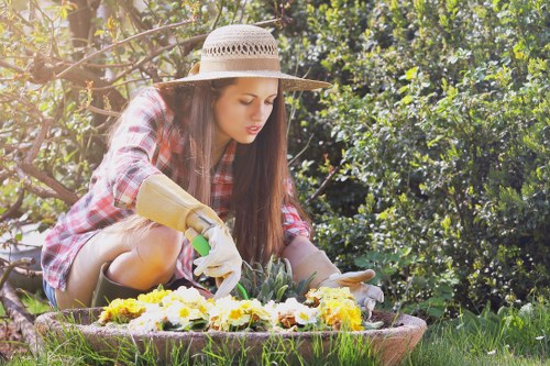 Professional landscaper designing a Wimbledon outdoor space